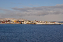 village from other side of bay